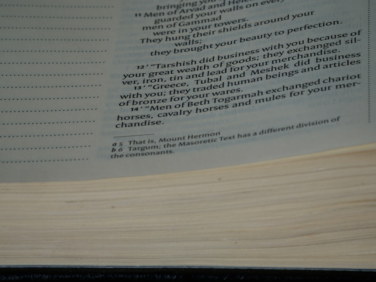 a close up of an open book with text